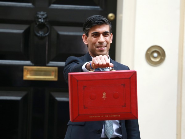 Rishi Sunak, Chancellor of the Exchequer holding red box.
