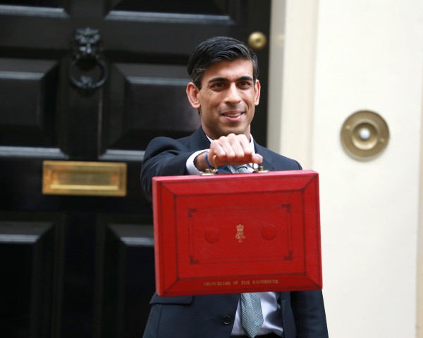 Rishi Sunak, Chancellor of the Exchequer holding red box.